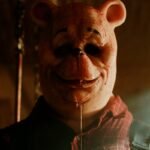 WINNIE POOH SANGE Y MIEL